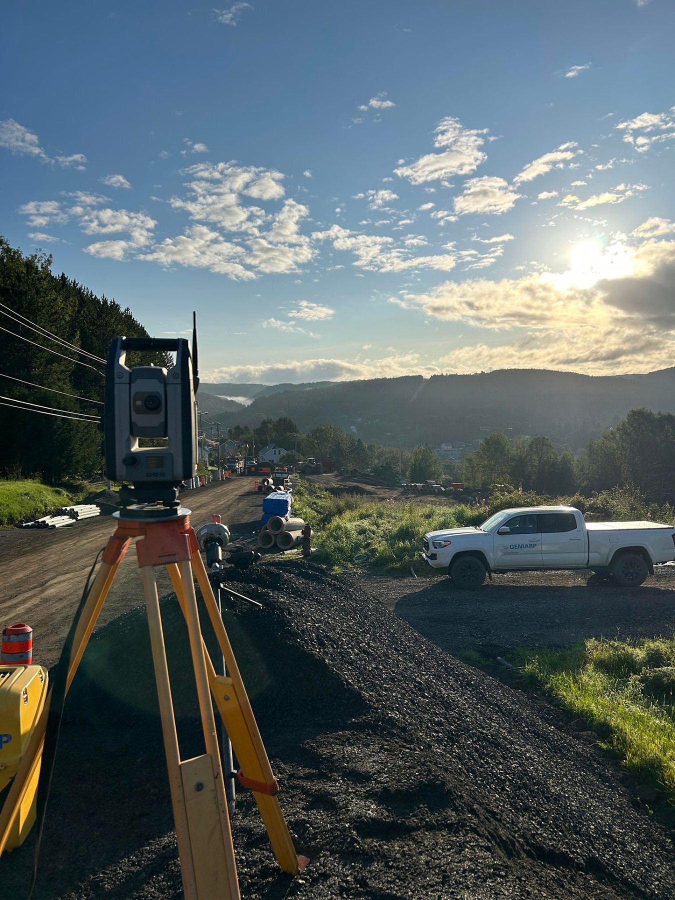 Total station set up at sunrise before a day of survey work